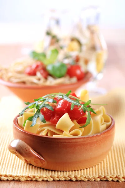 Ribbon pasta and peeled tomato — Stock Photo, Image