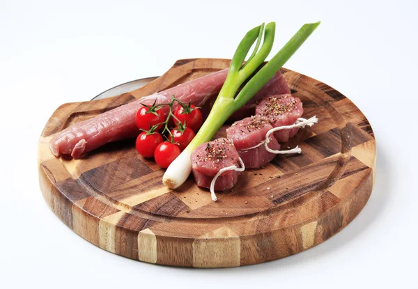Raw pork tenderloin and vegetables — Stock Photo, Image
