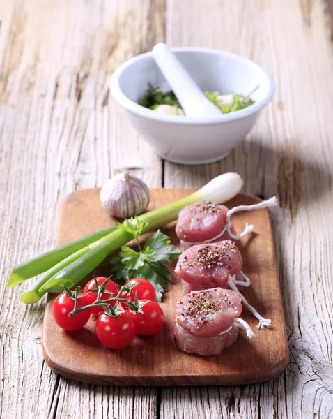 Raw pork tenderloin and vegetables — Stock Photo, Image