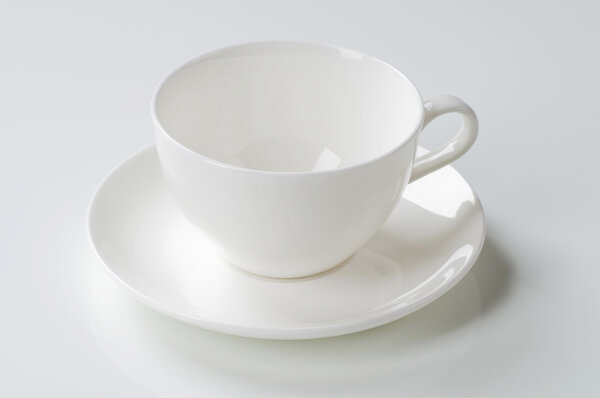 White cup and saucer