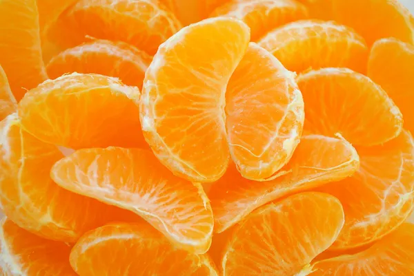 Os segmentos suculentos da tangerina . — Fotografia de Stock