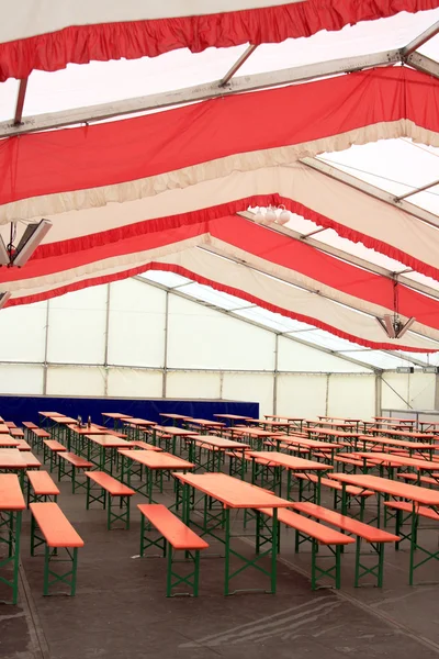 stock image Typical folding bench and table sets inside the beer hall at a german fair