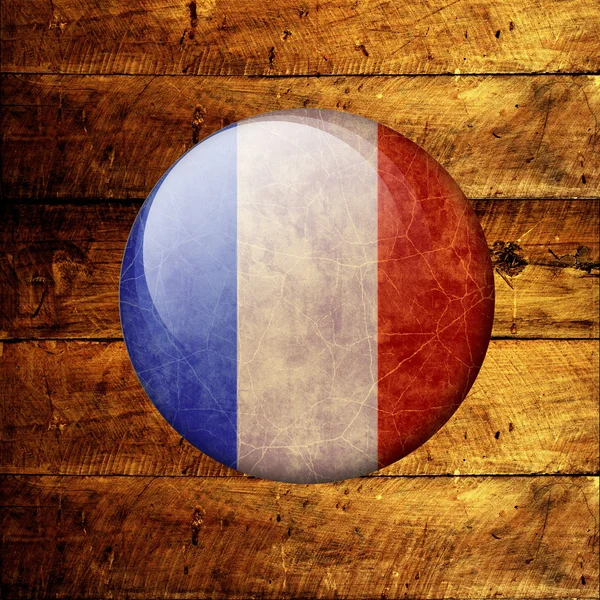 Grunge-Französisch auf Holzgrund — Stockfoto