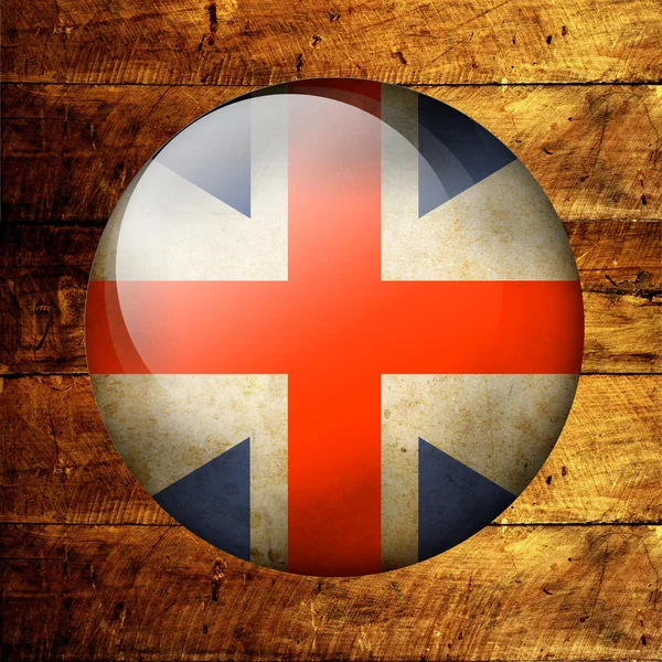Grunge britische Flagge der runden Form auf Holzgrund — Stockfoto