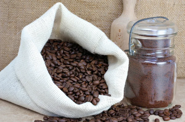 Coffee beans in a sack and Jar — Stock Photo, Image