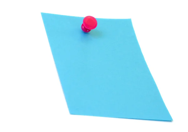 Papel azul, sobre branco, com tack . — Fotografia de Stock