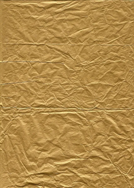 Papel de tecido de ouro enrugado para fundo — Fotografia de Stock