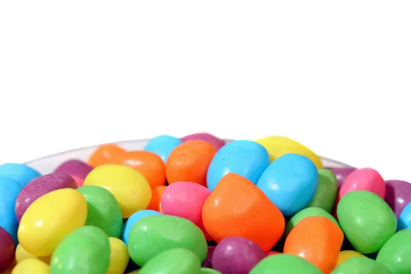 Jellybeans as a bottom border with copy space on white. — Stock Photo, Image