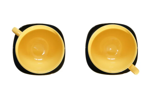 Большая Желтая Чашка Черное Блюдце Вид Сверху Изолированные Белом — стоковое фото
