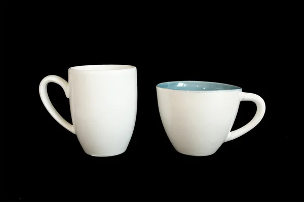 Two large white cup closeup isolated on black — Stock Photo, Image
