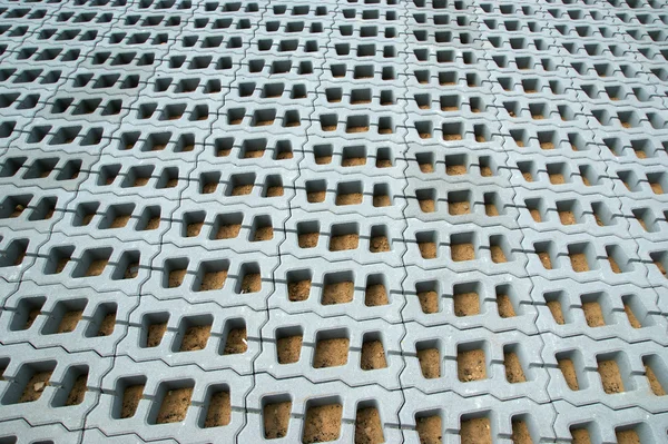 Rejilla de césped de estructuras de hormigón armado, se puede utilizar como fondo —  Fotos de Stock