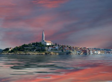 View of the old city Rovinj from the sea--city in Croatia situated on the north Adriatic Sea clipart