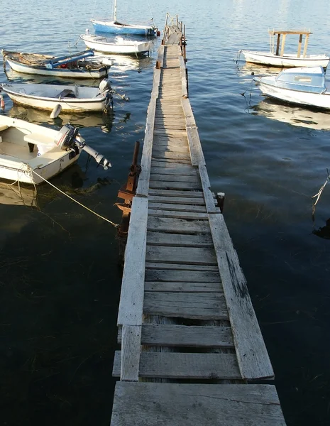 The wooden pier for boats and yachts — Stock Photo, Image