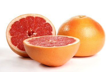 Ripe red grapefruit. Slice fruit on white background clipart