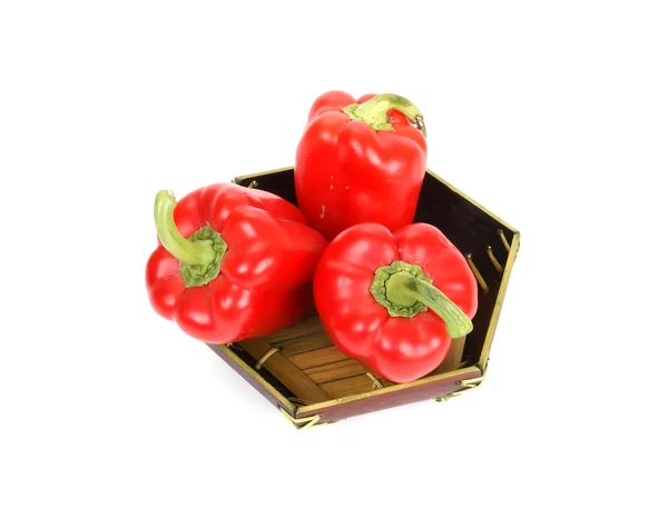 Velké čerstvé červené papriky na bílém pozadí — Stock fotografie