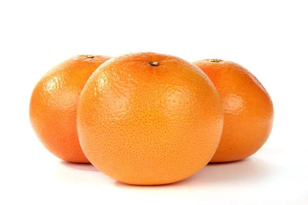 Große Grapefruits Nahaufnahme, auf weißem Hintergrund — Stockfoto