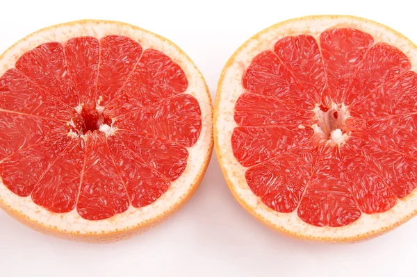 Toranja vermelha madura. Fruta de fatia no fundo branco — Fotografia de Stock