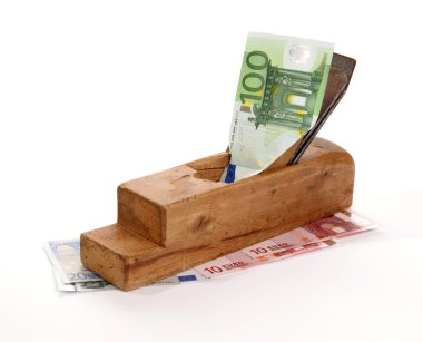 iş ve kazanmak. Planya ve kağıt banknot eski ahşap