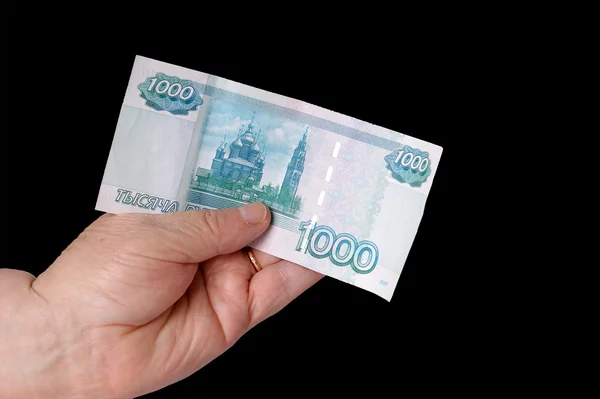 Kéz idősebb férfi gazdaság bankjegyek, elszigetelt fekete — Stock Fotó