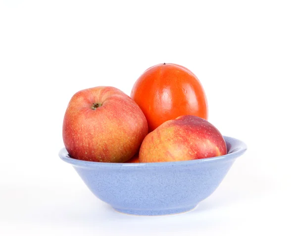 Stillleben mit roten Äpfeln und Kaki — Stockfoto