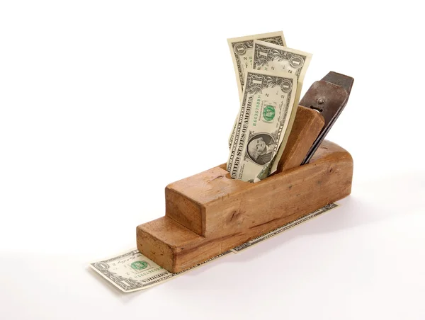 工作和收入。旧的木材刨刀和纸钞票 — 图库照片