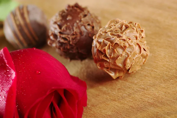 Truffles with a Red Rose — Stock Photo, Image