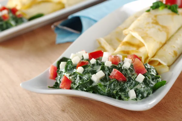 Spinach-Tomato-Cheese Sauce with Pancakes — Stock Photo, Image