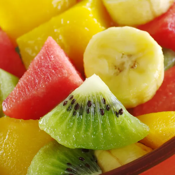 Mix owoców tropikalnych (kiwi, mango, banan, melon) — Zdjęcie stockowe