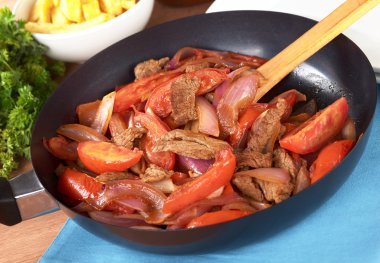 Peruvian Dish Called Lomo Saltado clipart