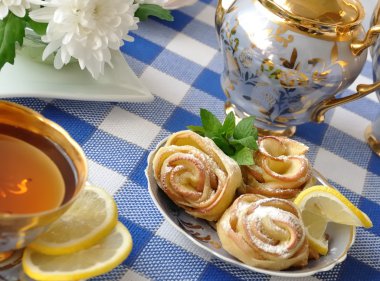 Rosettes from apples and dough clipart