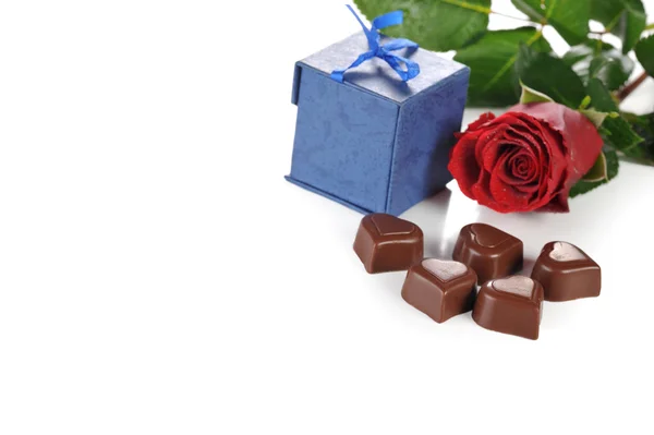 Rose and gifts in box — Stock Photo, Image