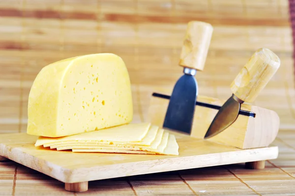 Stock image Wooden plate and knives