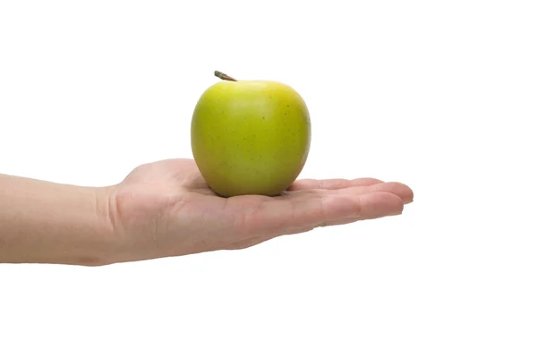 Zielone i żółte jabłko na otwartej dłoni na białym tle — Zdjęcie stockowe