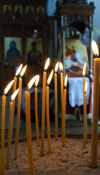 stock image Burning candles in a church