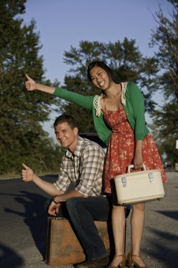 Hitching young couple clipart