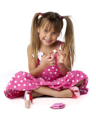 Cute Female Youngster Aplying Nail Polish clipart