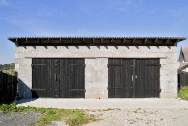 Rural garage from slag blocks clipart