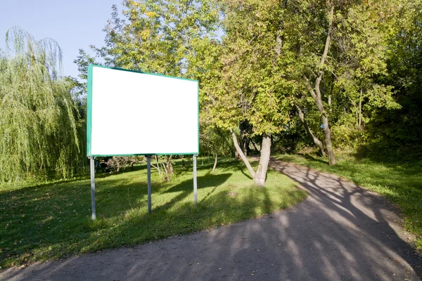 Clear billboard in forest — Stock Photo, Image