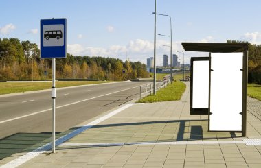 Bus stop on a high-speed highway near to a megacity clipart