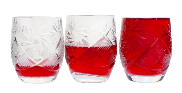 stock image Three crystal wine-glasses with wine