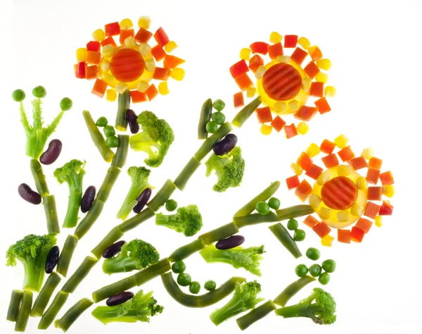Bloemen van segmenten van groenten — Stockfoto
