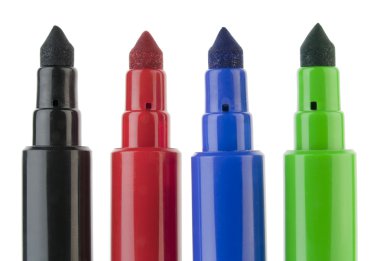 Usual real felt-tip black, red, blue, green pens macro isolated on white clipart