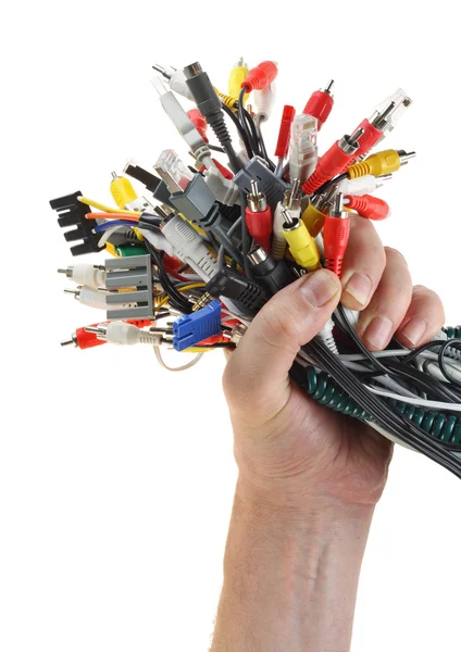 Hand holds set of cables with connectors — Stock Photo, Image