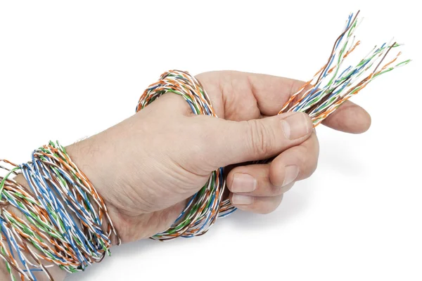 Technician has prepared a computer cable for connection — Stock Photo, Image