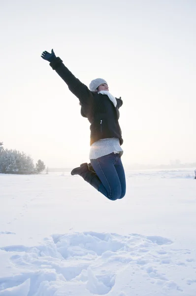 图像的跳跃在雪的女孩 — 图库照片