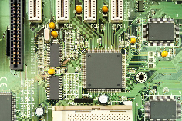 Technology background: a computer mother board with electrical paths and electronic components
