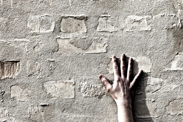 Mão um einer Mauer — Fotografia de Stock