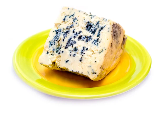 Rebanada de queso mohoso francés Imágenes de stock libres de derechos