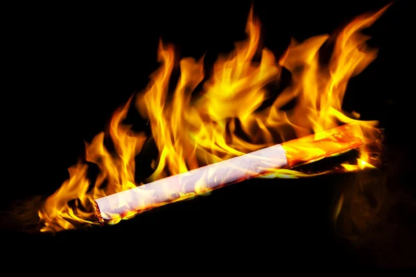 Cigarette in fire — Stock Photo, Image