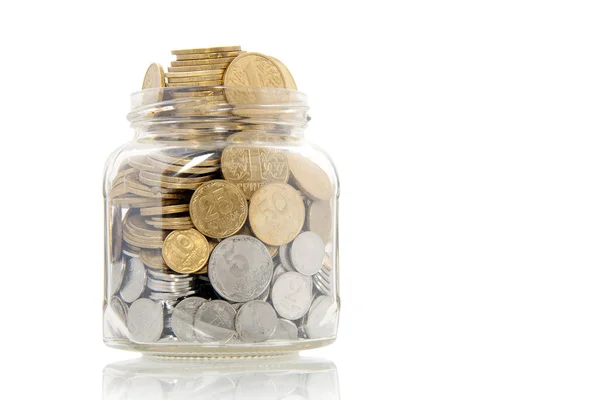 Coins in jar — Stock Photo, Image